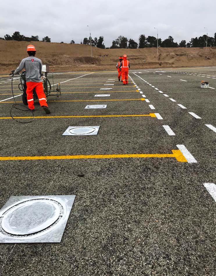 Marquage au sol des parking pour les jeux panamaricain à Lima